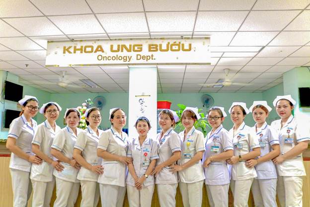 A group of women in white uniforms
Description automatically generated with medium confidence